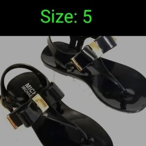 Michael Kors Glossy Black Jelly Bow Thong Sandals with Gold Accent